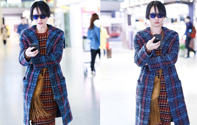 周迅毛呢大衣现身机场嘟嘴表情少女满分!